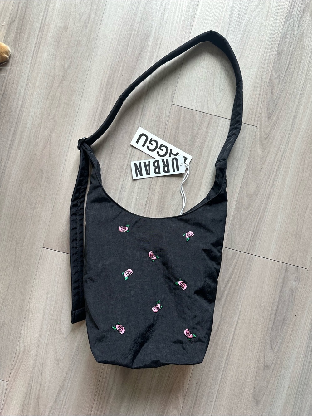 BAGGU x urban outfitters small nylon sling bag. Black w/pink rose embroidery NWT